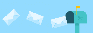 Three envelopes flying into a mailbox marked with the @ symbol.