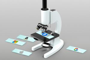 A microscope surrounded by slides marked with the logos of several popular social media platforms. The slide for Facebook is mounted under the microscope itself.